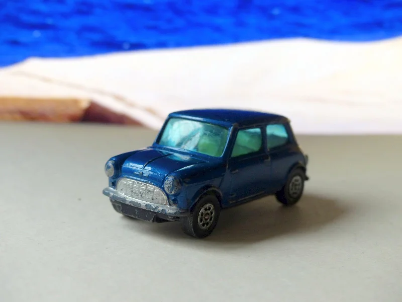 Train stations with modern facilities​ 204 Morris Mini-Minor in metallic blue with black base