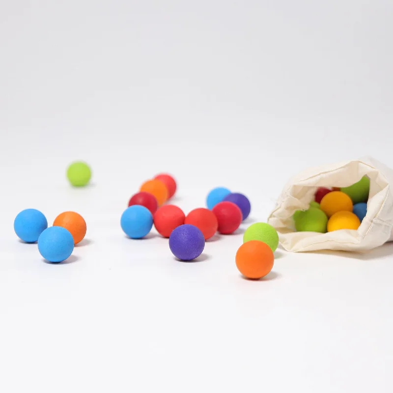 Wooden play scooters for outdoor mobility play​ Grimm's Wooden Marbles 35 Pieces